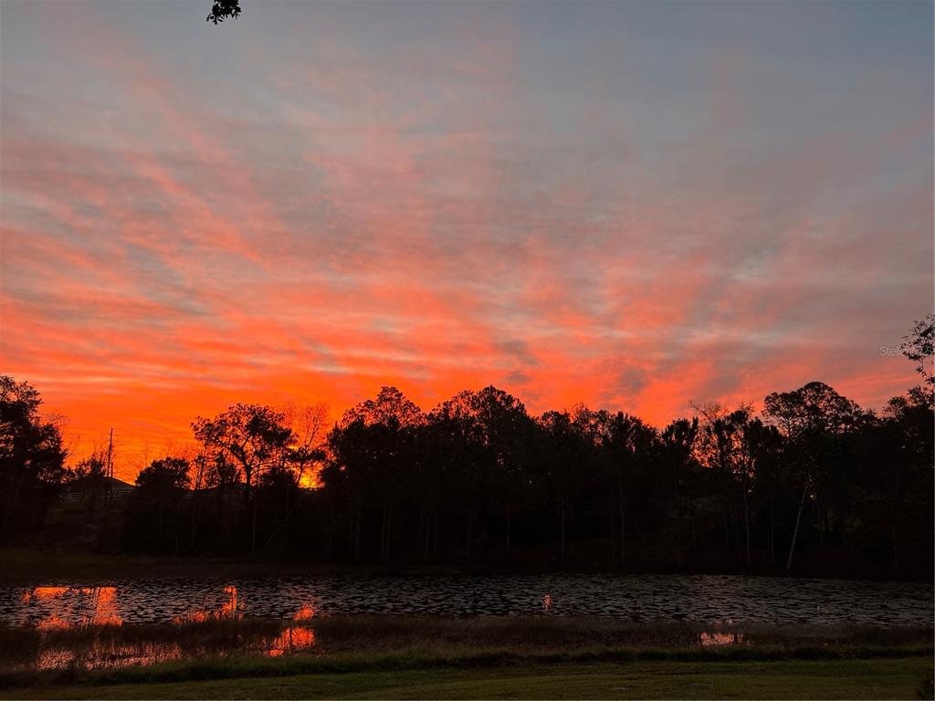5526 Tiny Road Winter Garden, FL 34787 - Photo 32 of 39 a view of sunset
