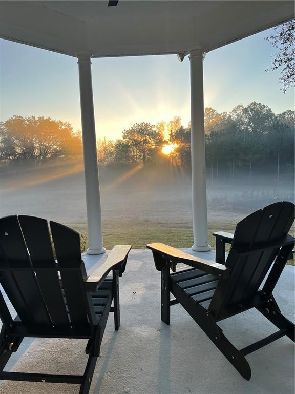 5526 Tiny Road Winter Garden, FL 34787 - Photo 35 of 39 a view of a balcony with chairs