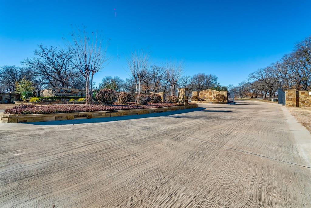 28 Ballpark Way Jacksboro, TX 76458 - Photo 14 of 14 a view of road with large trees