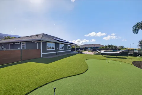 a view of a house with a swimming pool