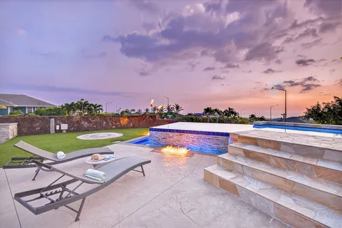a view of a chairs and table on the terrace