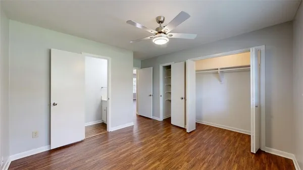 a view of a livingroom with wooden floor