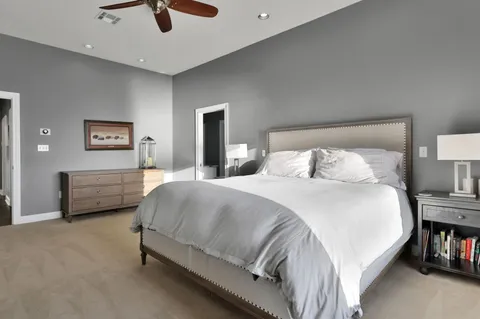 a view of bedroom with furniture