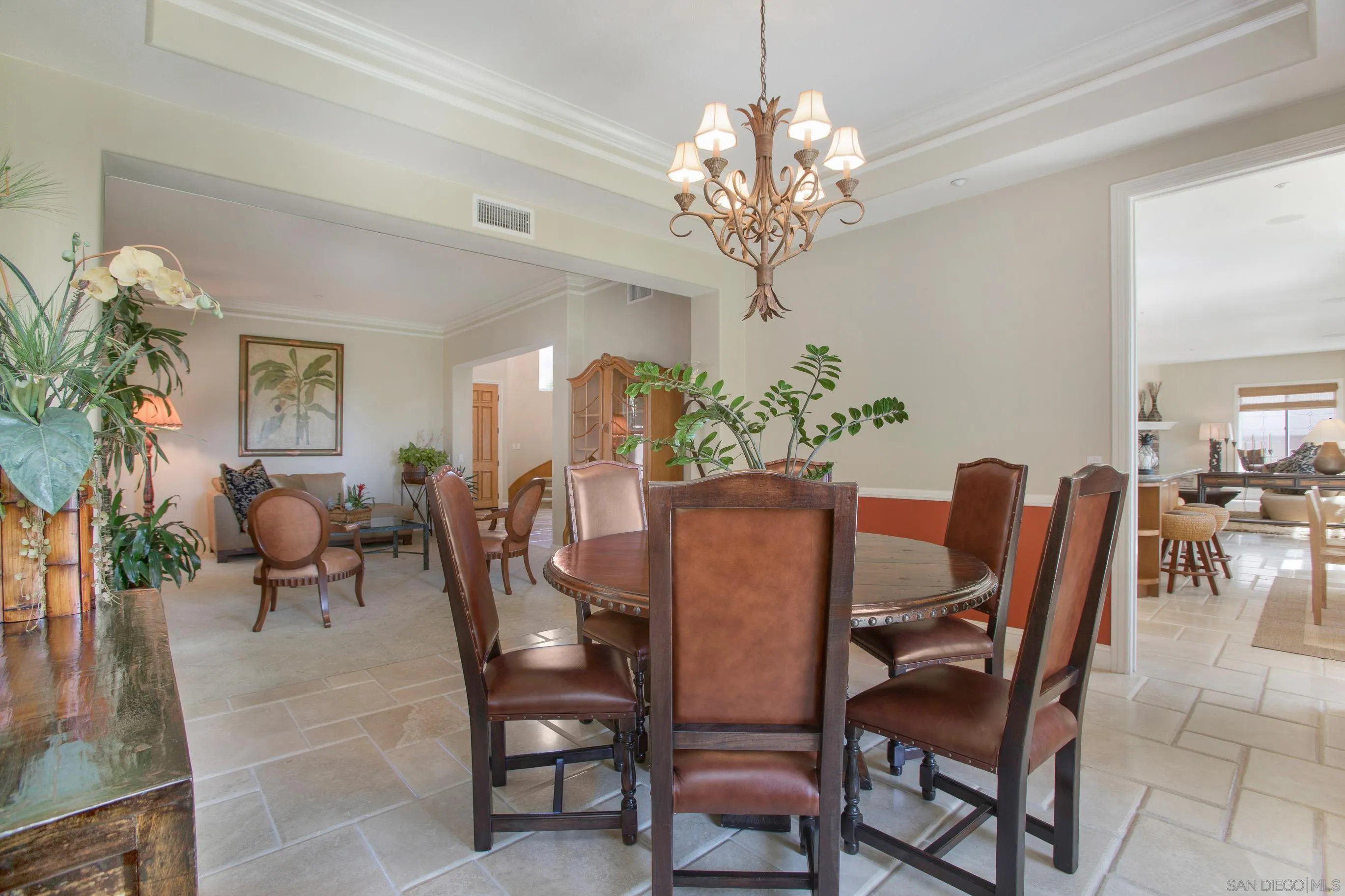 562 Shasta Drive Encinitas, CA 92024 - Photo 19 of 59 a view of a dining room with furniture and chandelier