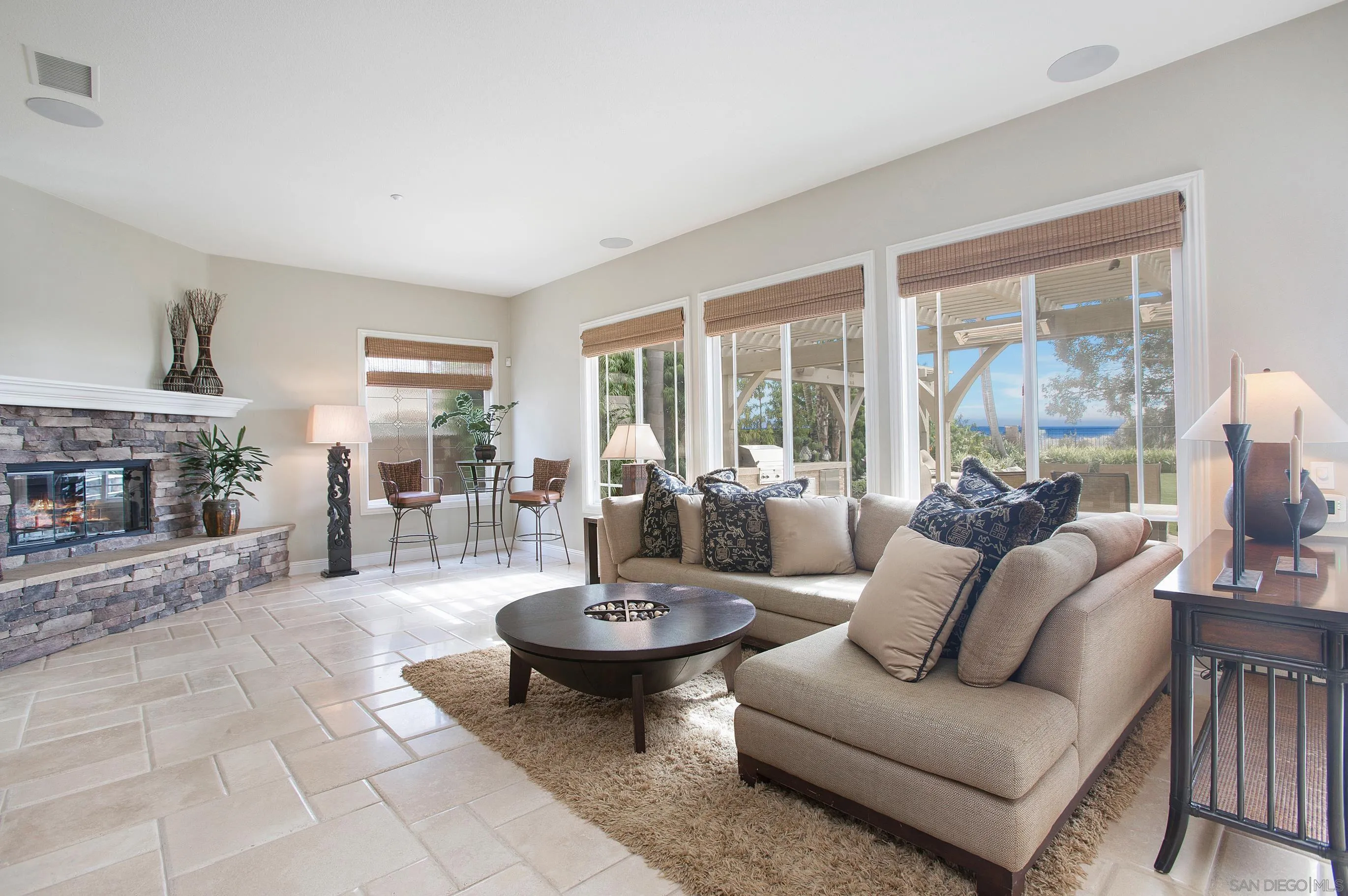 562 Shasta Drive Encinitas, CA 92024 - Photo 26 of 59 a living room with furniture and a fireplace