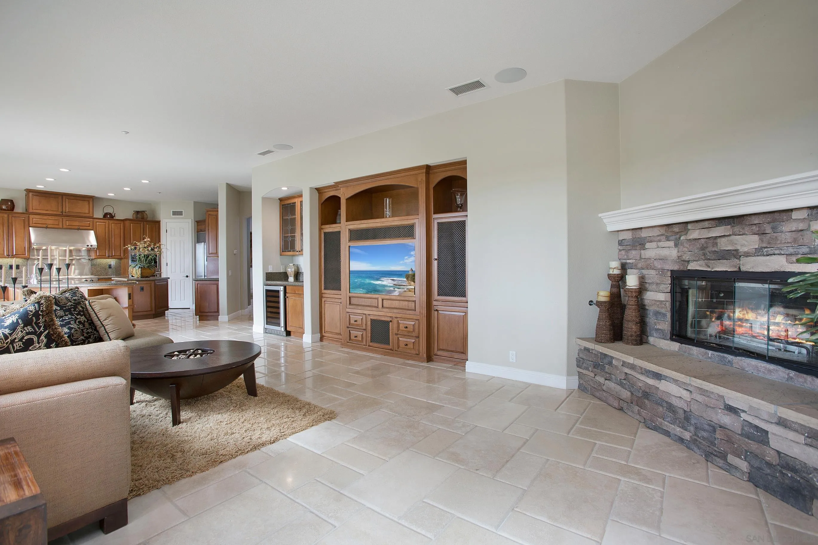 562 Shasta Drive Encinitas, CA 92024 - Photo 28 of 59 a living room with furniture and a fireplace
