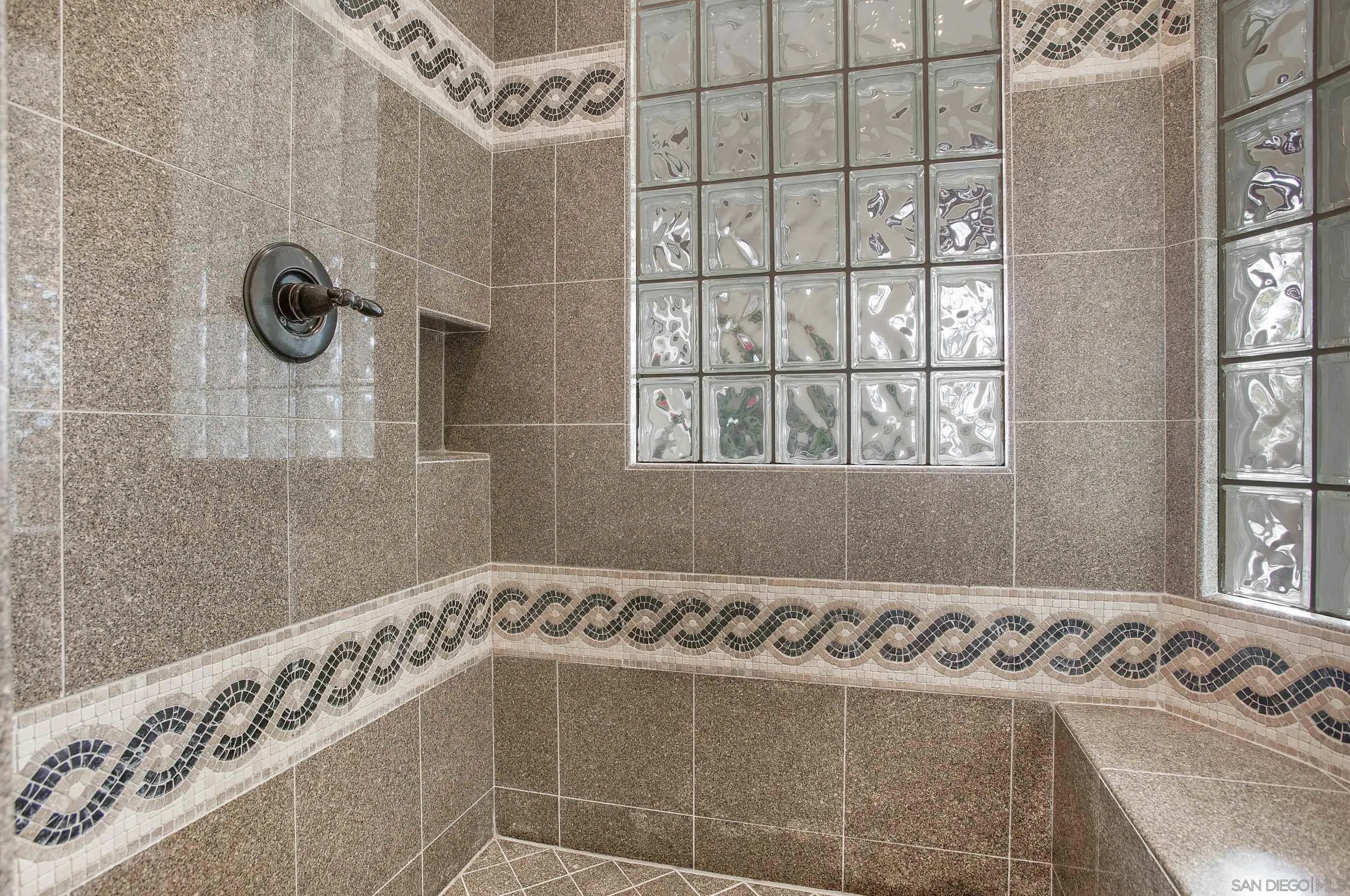 562 Shasta Drive Encinitas, CA 92024 - Photo 43 of 59 a bathroom with a bathtub and shower