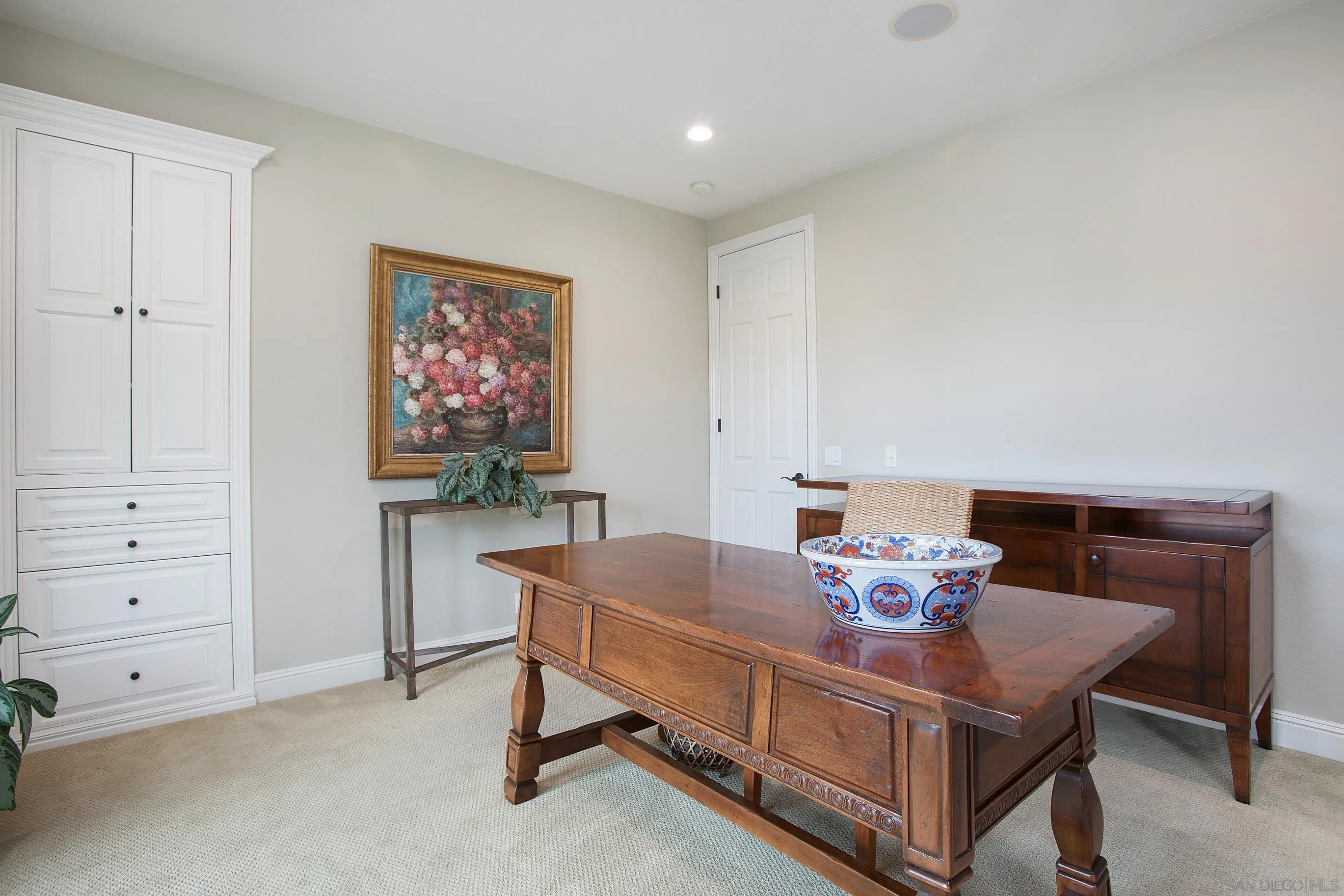 562 Shasta Drive Encinitas, CA 92024 - Photo 44 of 59 a view of a dining room with furniture and a chandelier