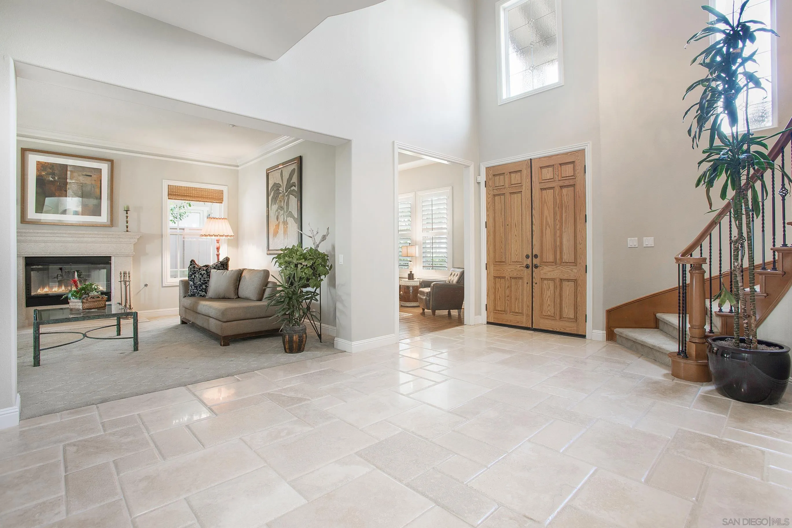 562 Shasta Drive Encinitas, CA 92024 - Photo 9 of 59 a living room with furniture and a fireplace