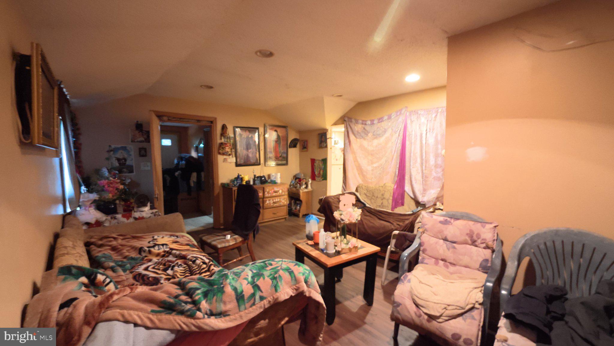458 North Burlington Road Bridgeton, NJ 08302 - Photo 3 of 9 Cozy living space with eclectic charm.