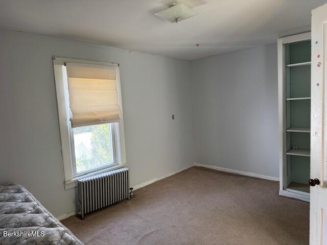 15 Golden Hill Road Lenox, MA 01242 - Photo 8 of 10 an empty room with windows