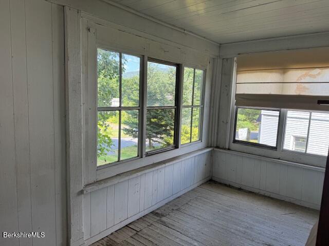15 Golden Hill Road Lenox, MA 01242 - Photo 9 of 10 a view of an empty room with wooden floor and a window