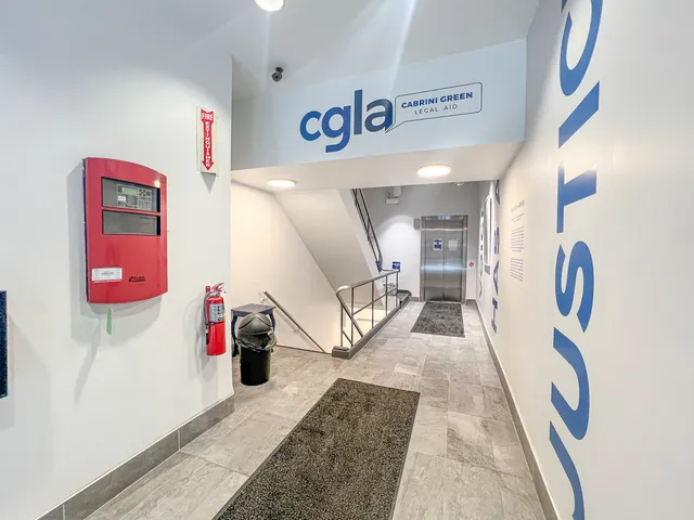 a view of a hallway with dining area