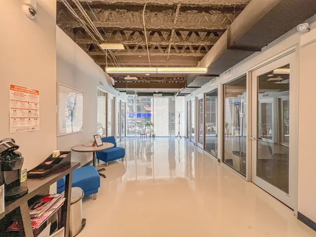 a bathroom with a sink a large mirror and a shower