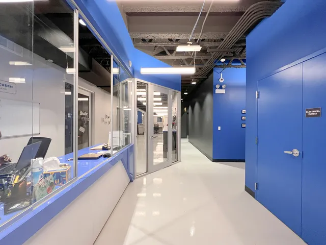 a view of a hallway with seating space