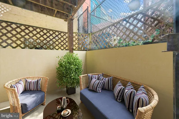 a balcony with furniture