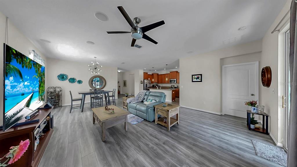 2408 Nighthawk Landing Court Ruskin, FL 33570 - Photo 19 of 50 a living room with furniture and a flat screen tv