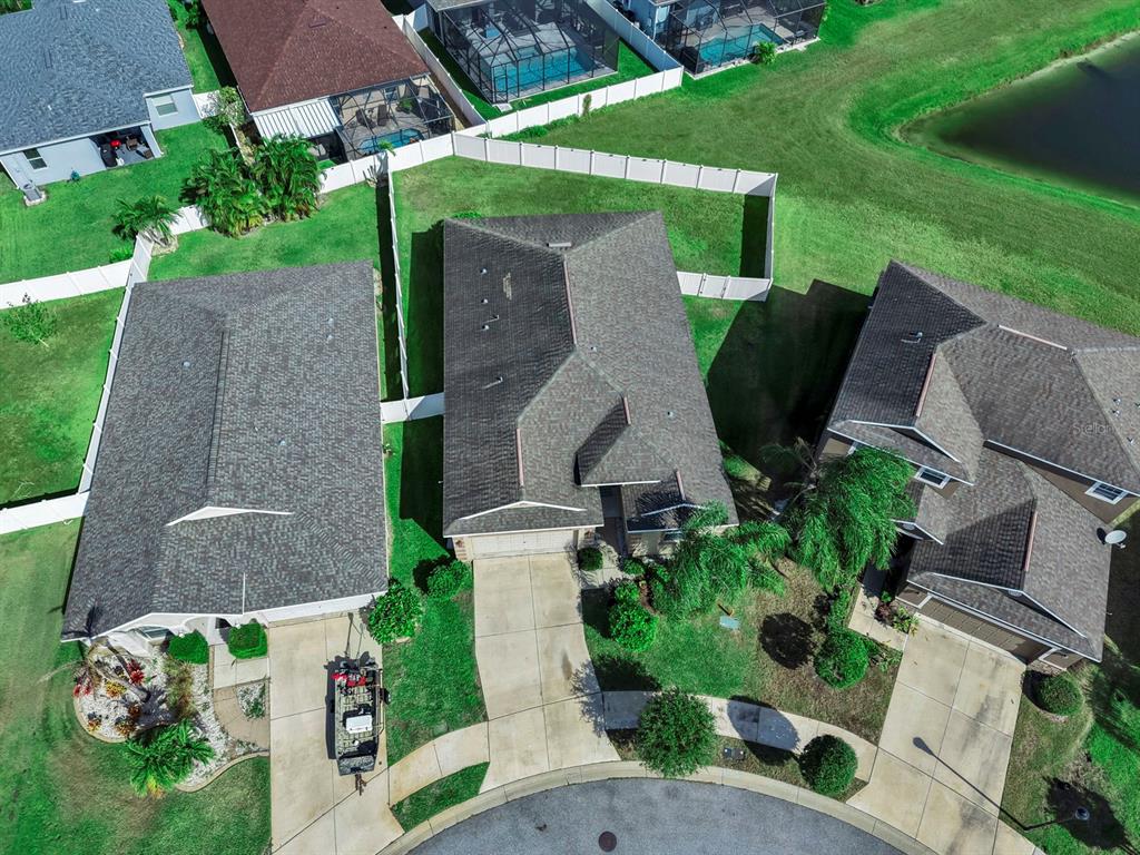 2408 Nighthawk Landing Court Ruskin, FL 33570 - Photo 38 of 50 an aerial view of a house with garden space and street view