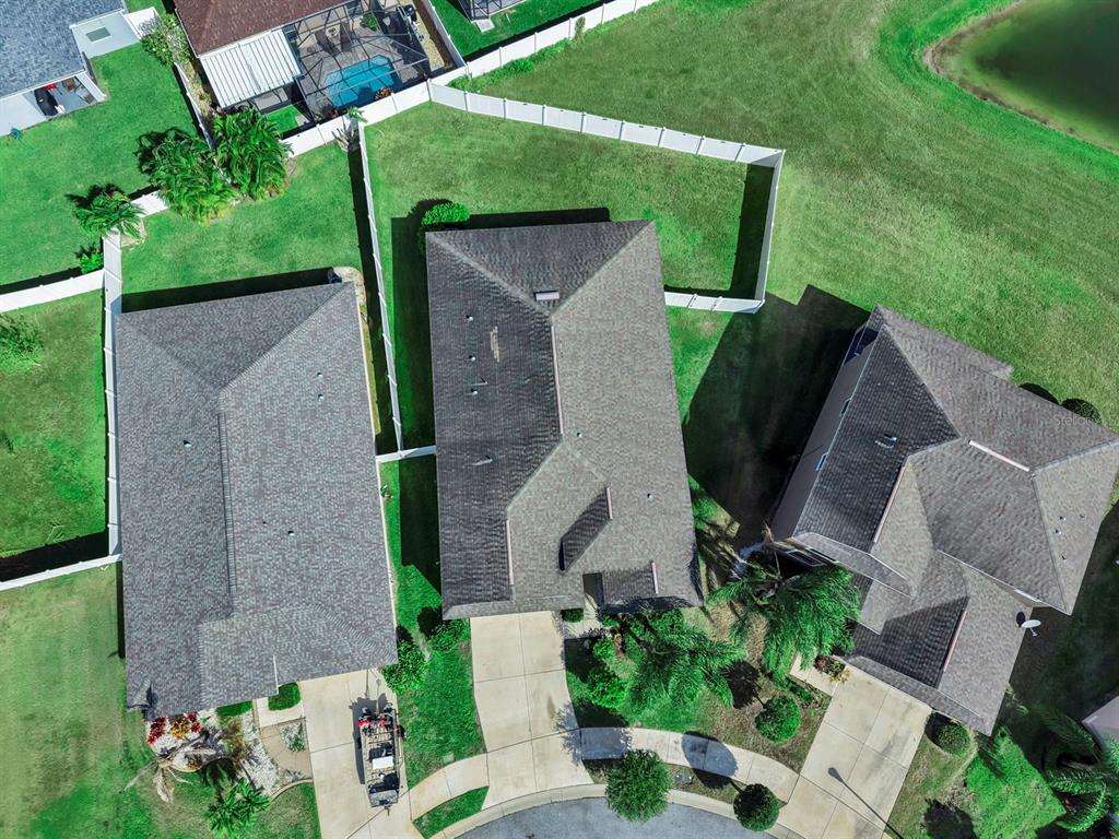 2408 Nighthawk Landing Court Ruskin, FL 33570 - Photo 39 of 50 an aerial view of a house with garden space and a street view