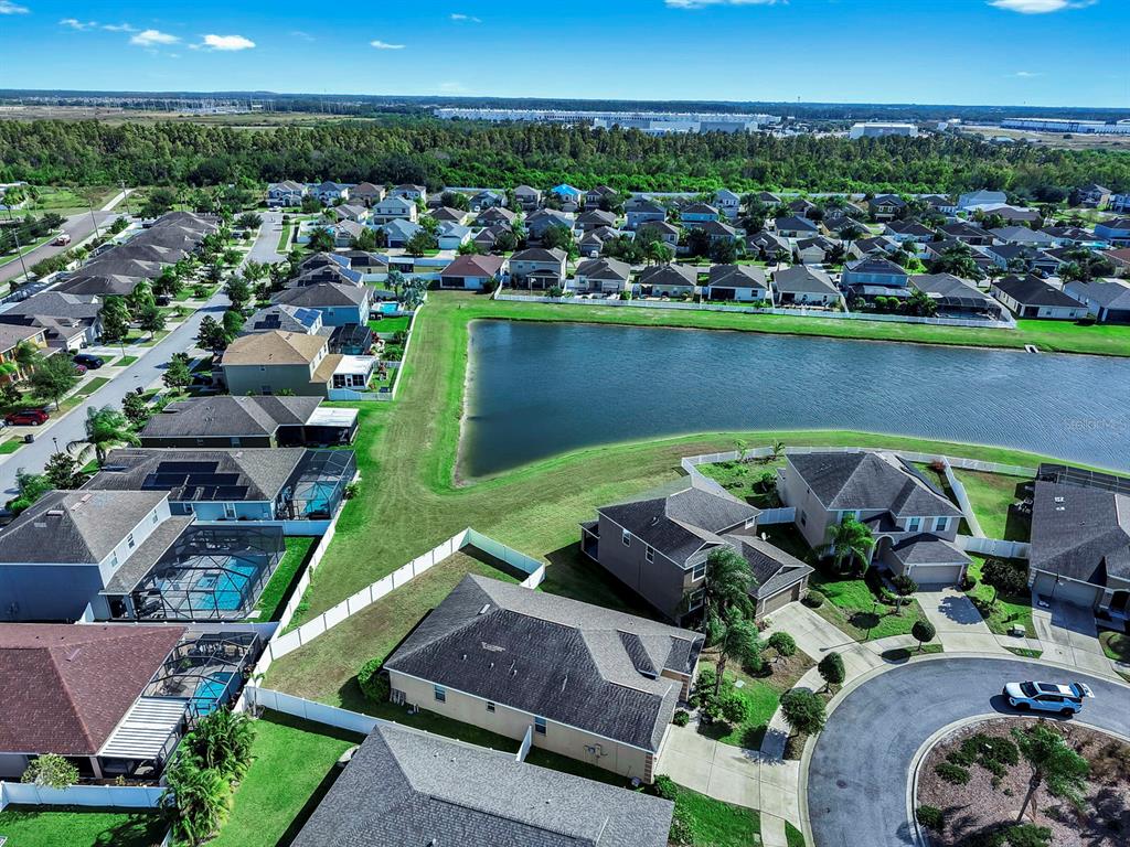 2408 Nighthawk Landing Court Ruskin, FL 33570 - Photo 40 of 50 a view of a city with lawn chairs