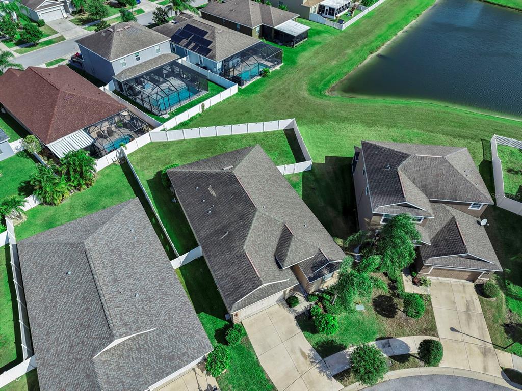 2408 Nighthawk Landing Court Ruskin, FL 33570 - Photo 43 of 50 an aerial view of a house with garden space and street view