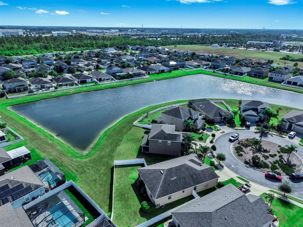 2408 Nighthawk Landing Court Ruskin, FL 33570 - Photo 46 of 50 an aerial view of a house with a garden