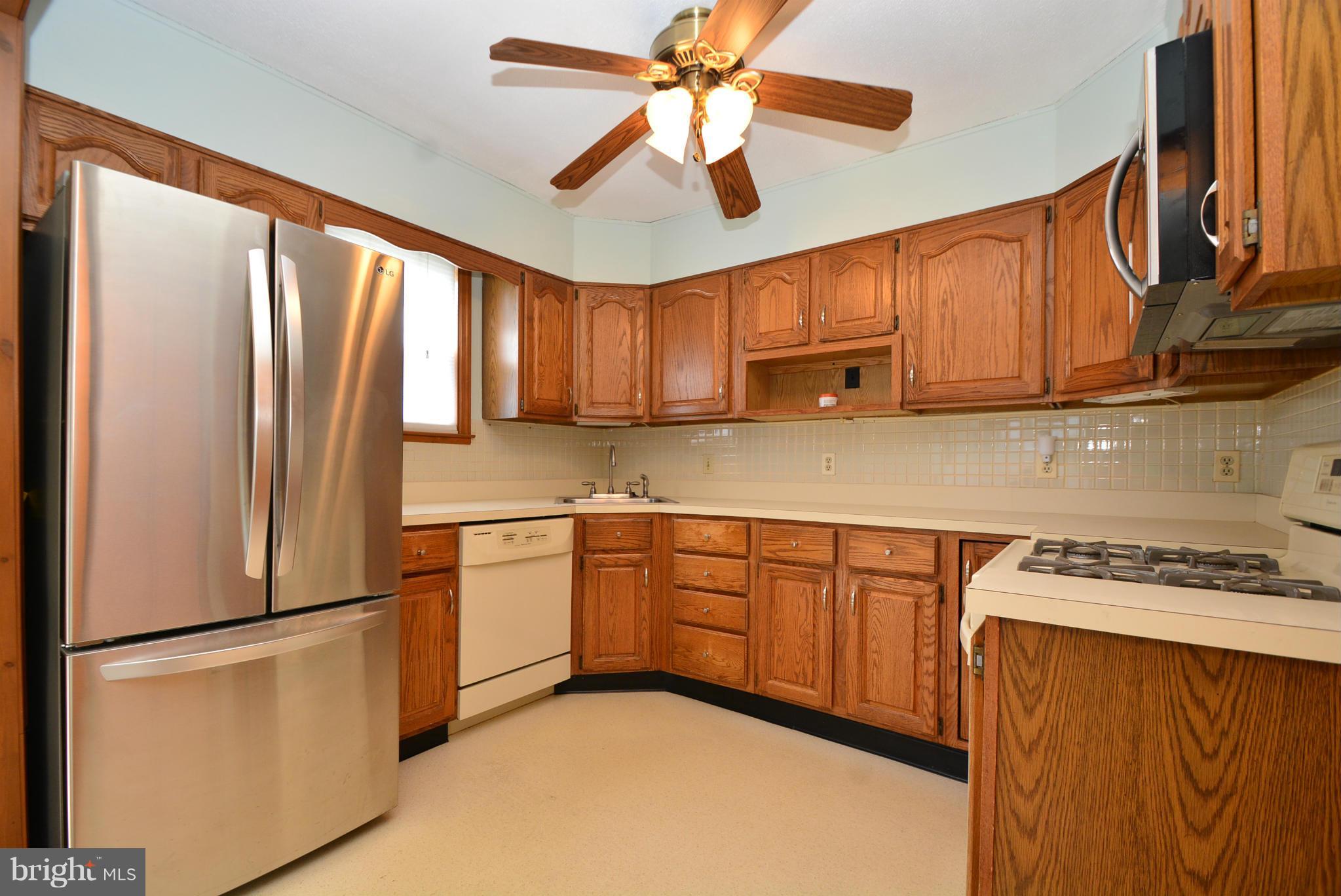 8761 Old Harford Road Baltimore, MD 21234 - Photo 2 of 30 Stainless refrigerator