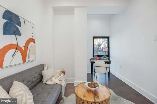 a room with a table and couch