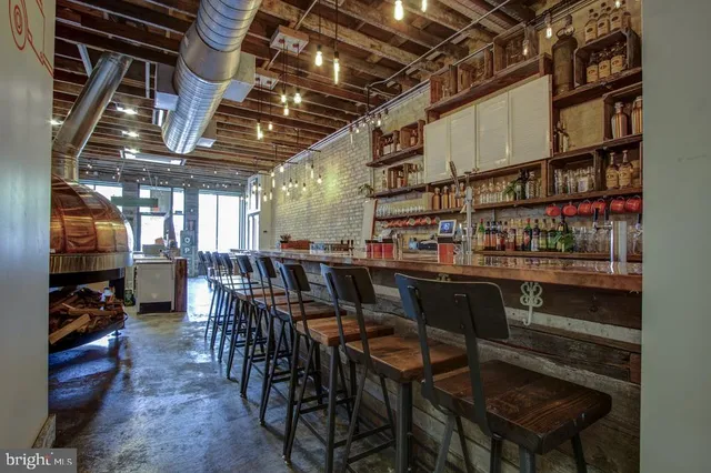 a view of a chairs and table in a room