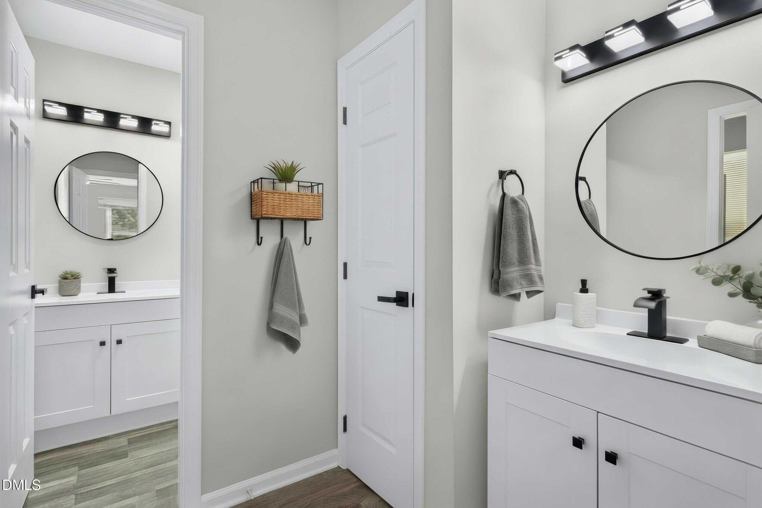 708 Powell Drive, Unit A Raleigh, NC 27606 - Photo 10 of 20 Bath on the main floor. Has been virtually staged