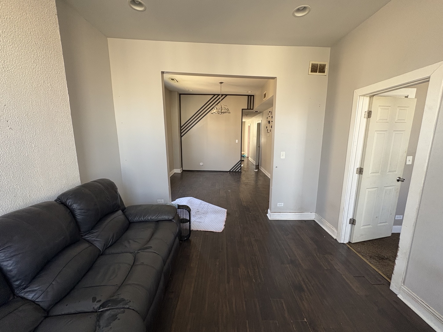 3843 West Fillmore Street Chicago, IL 60624 - Photo 14 of 38 a living room with furniture and a wooden floor