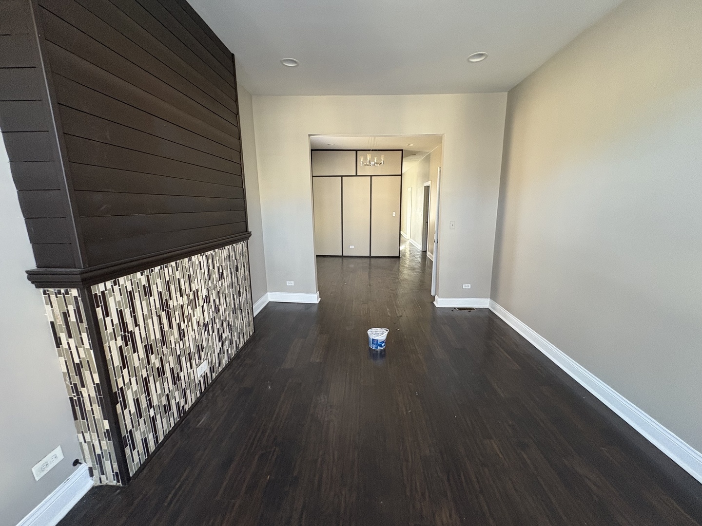 3843 West Fillmore Street Chicago, IL 60624 - Photo 18 of 38 a view of a hallway with wooden floor and staircase