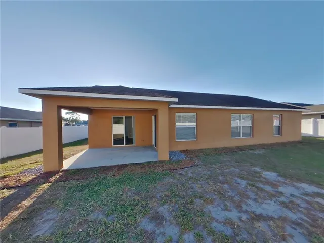 a view of backyard of house