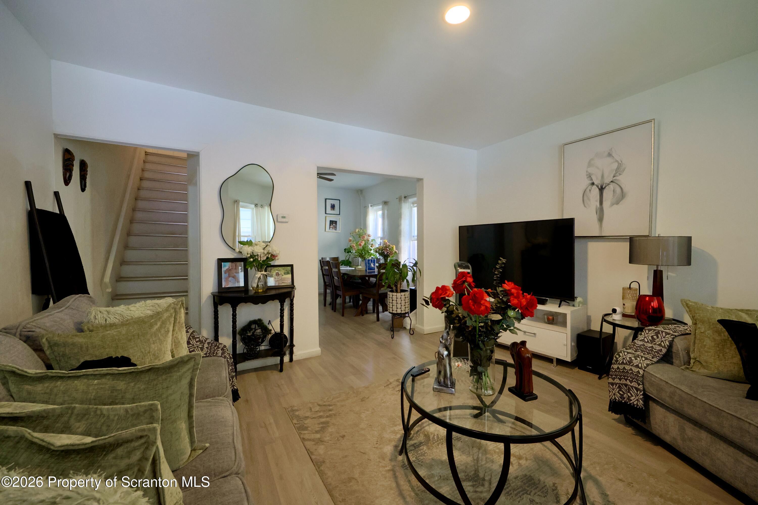 1016-1018 Diamond Avenue Scranton, PA 18508 - Photo 2 of 15 a living room with furniture and a flat screen tv