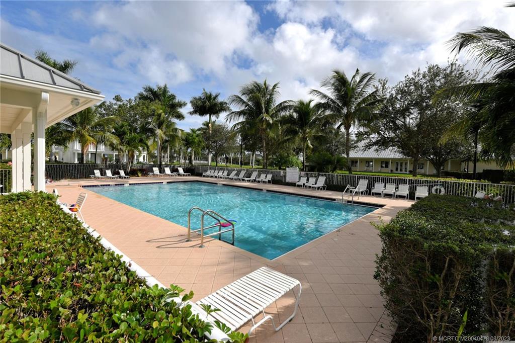 1162 Tropical Drive Jupiter, FL 33458 - Photo 40 of 43 a view of swimming pool and lake view