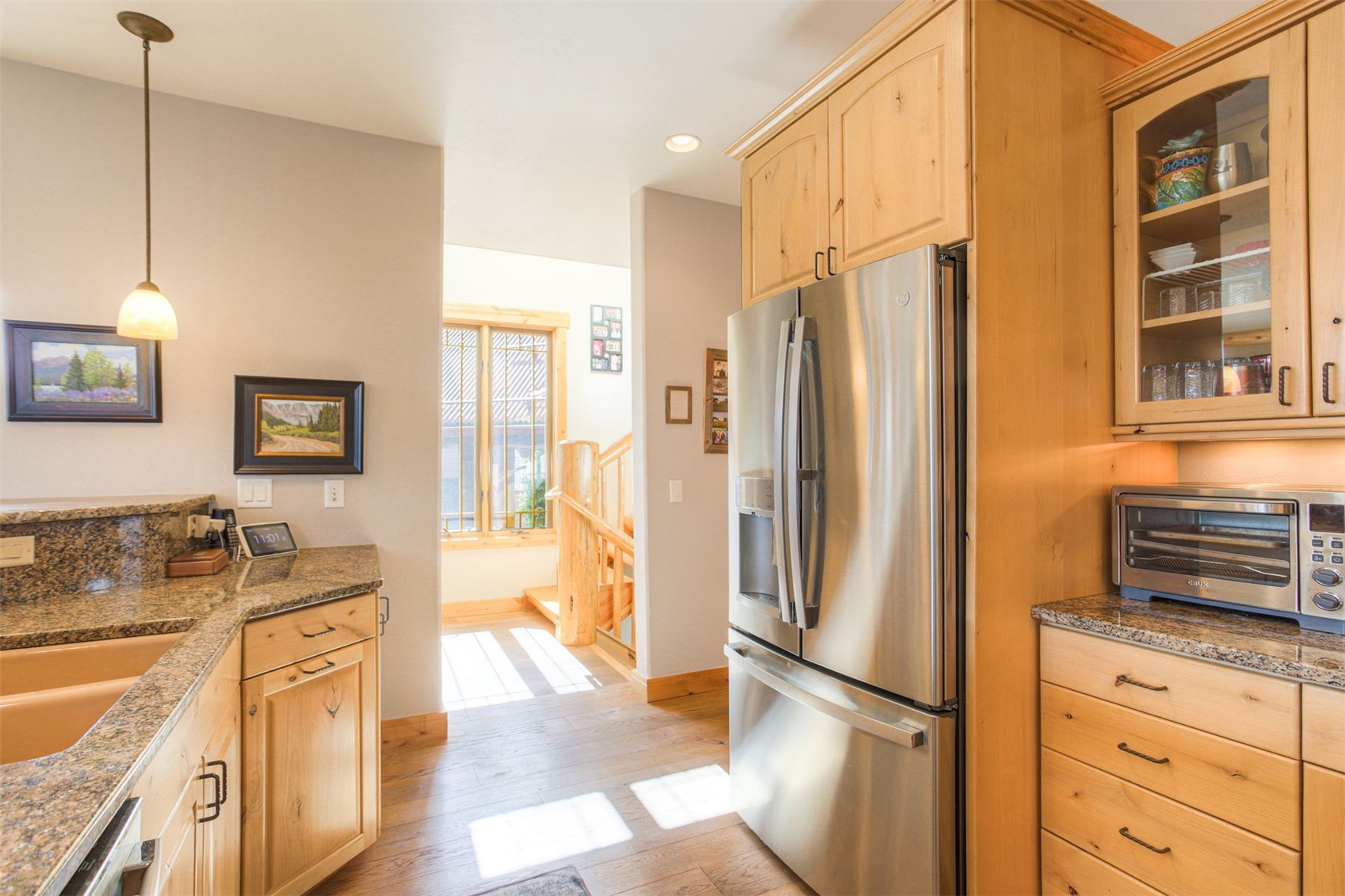727 Willowbrook Road Silverthorne, CO 80498 - Photo 9 of 47 a kitchen with stainless steel appliances granite countertop a refrigerator and a stove top oven