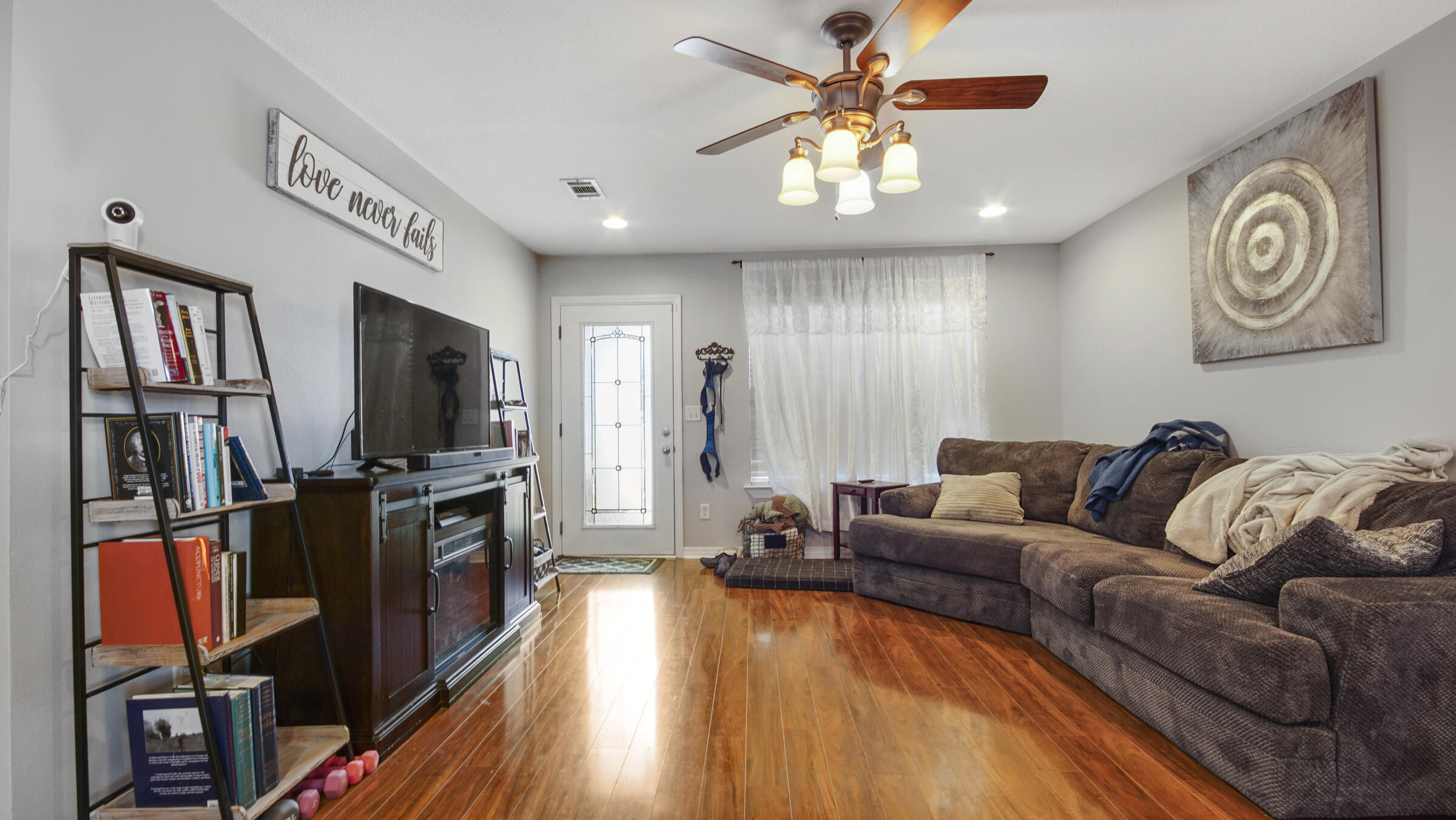 908 Valley Road Crestview, FL 32539 - Photo 12 of 22 a living room with furniture and a flat screen tv