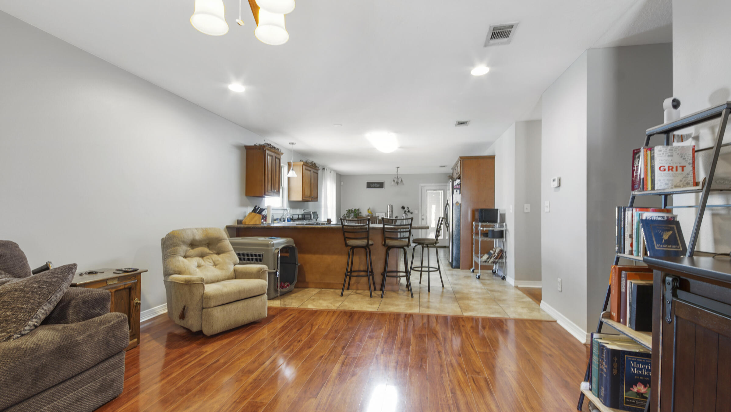908 Valley Road Crestview, FL 32539 - Photo 22 of 22 a living room with furniture and a wooden floor
