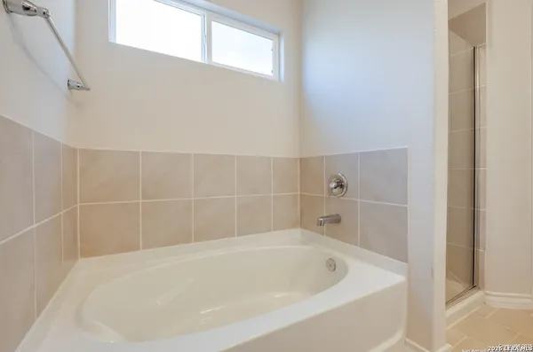 a view of a bathtub in a bathroom