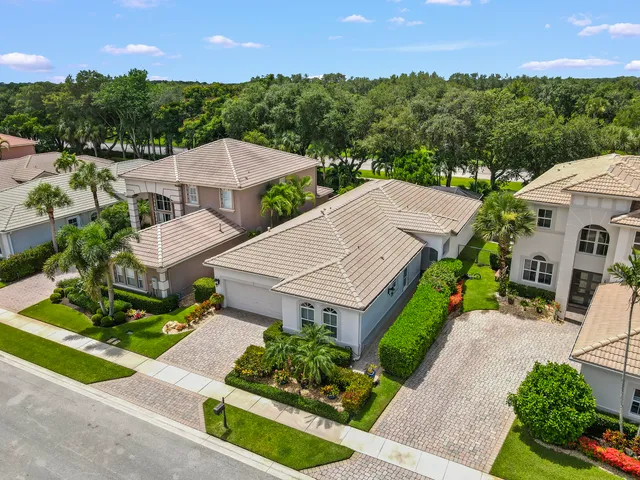 an aerial view of a house with a garden