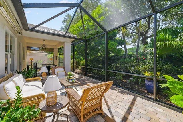 a view of an chairs and table in the patio