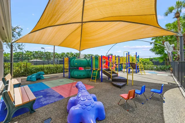 a outdoor space with furniture and umbrella
