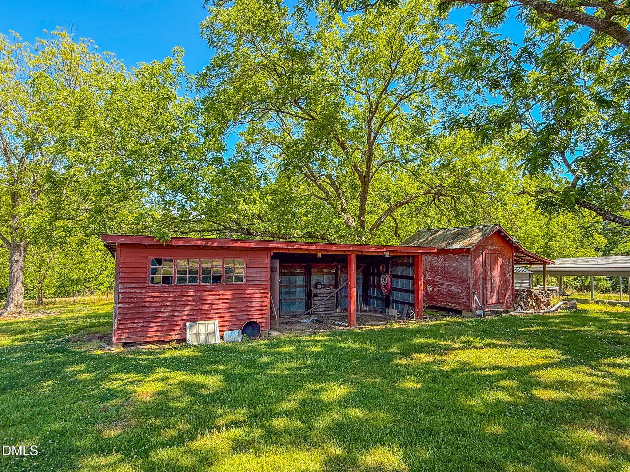 1001 Charlie Reade Road Timberlake, NC 27583 - Photo 22 of 64 a view of a house with a backyard