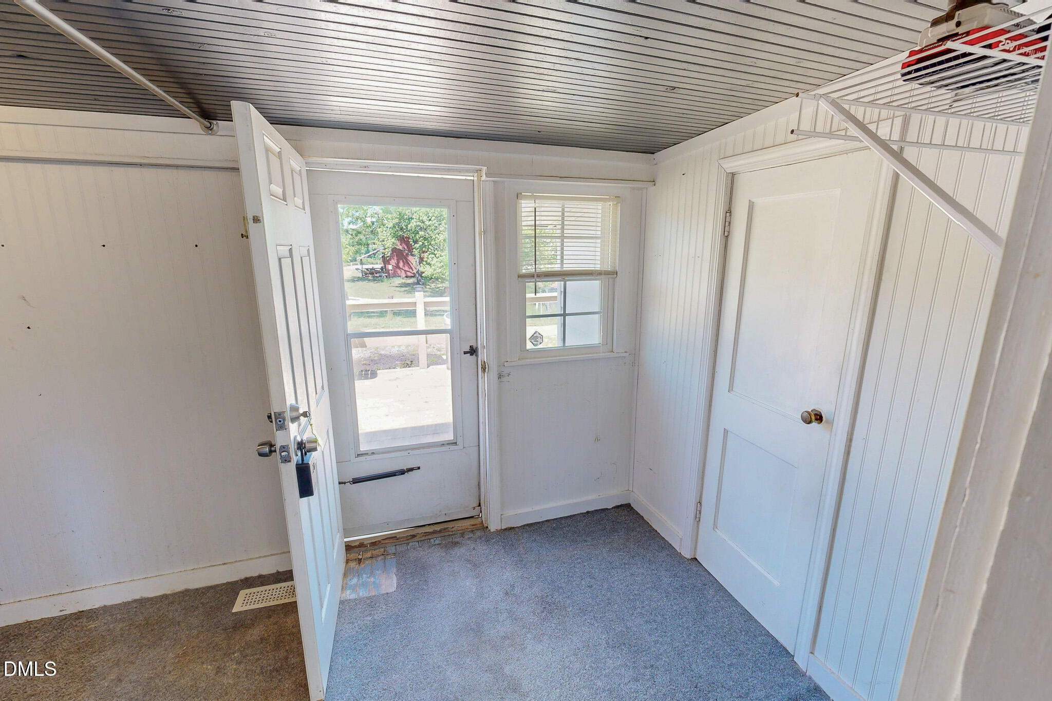 1001 Charlie Reade Road Timberlake, NC 27583 - Photo 32 of 64 a view of an empty room with a window