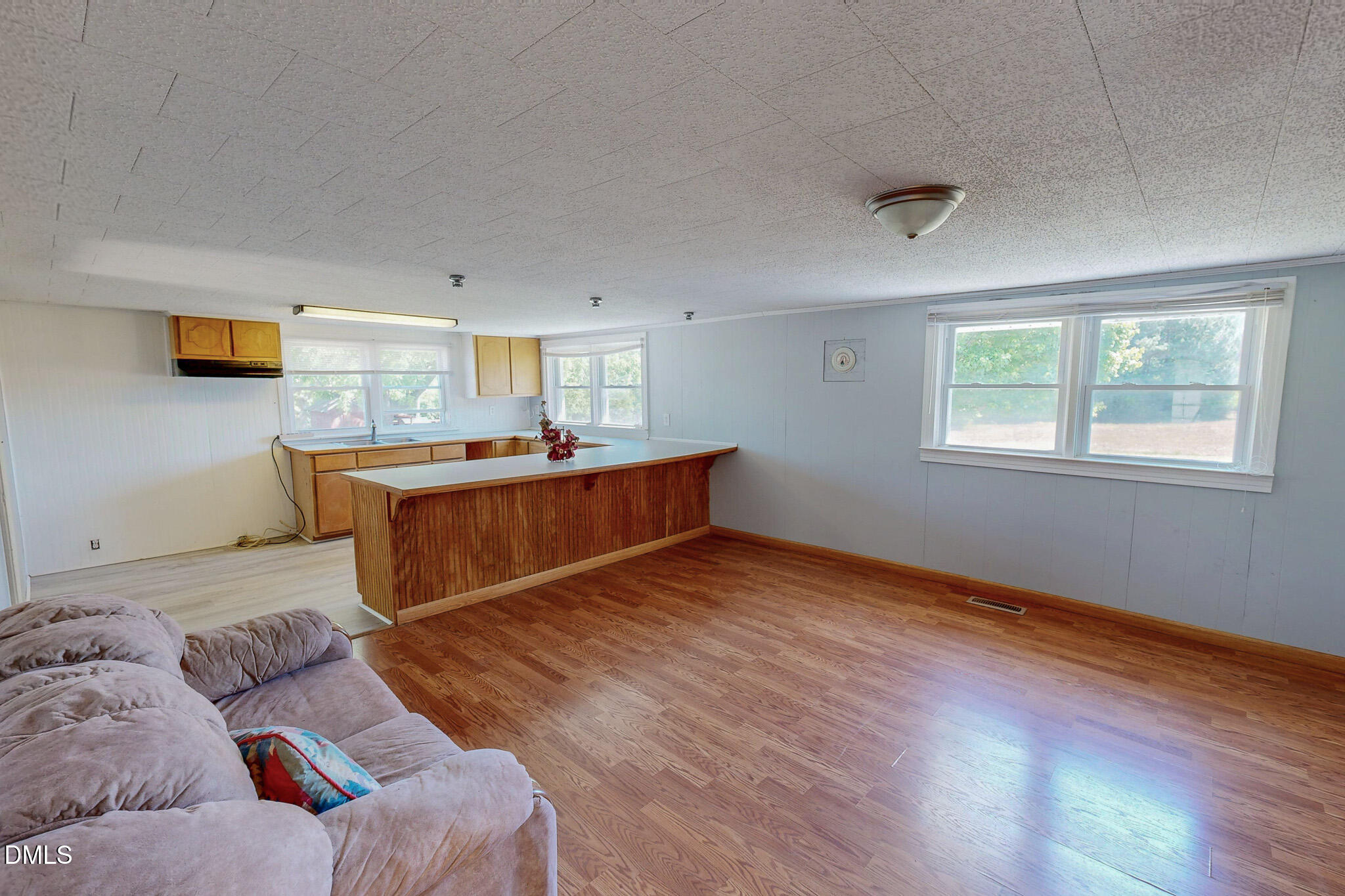 1001 Charlie Reade Road Timberlake, NC 27583 - Photo 36 of 64 a living room with a bed furniture and a window