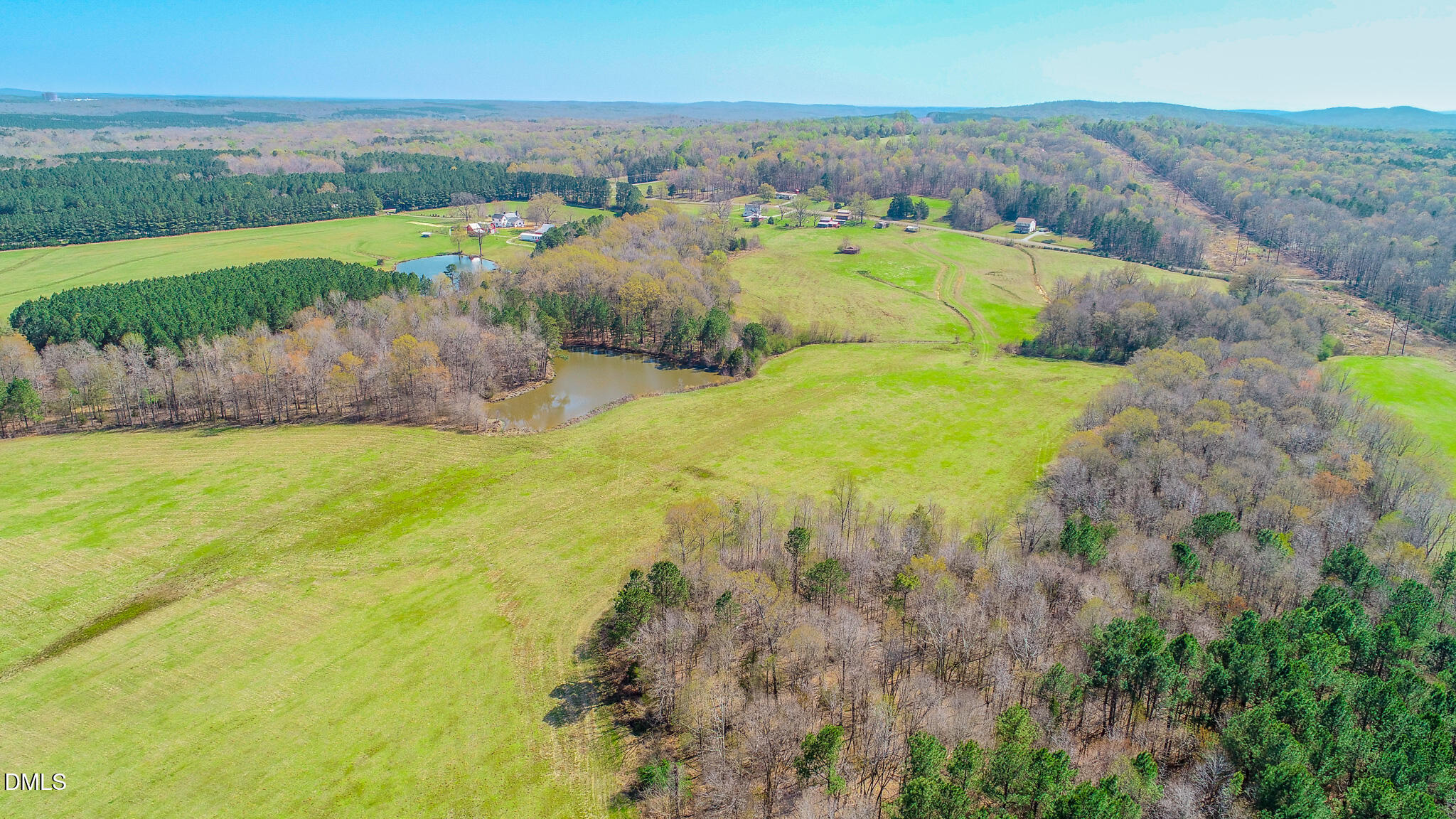 1001 Charlie Reade Road Timberlake, NC 27583 - Photo 45 of 64 a view of a lake with mountains in the background