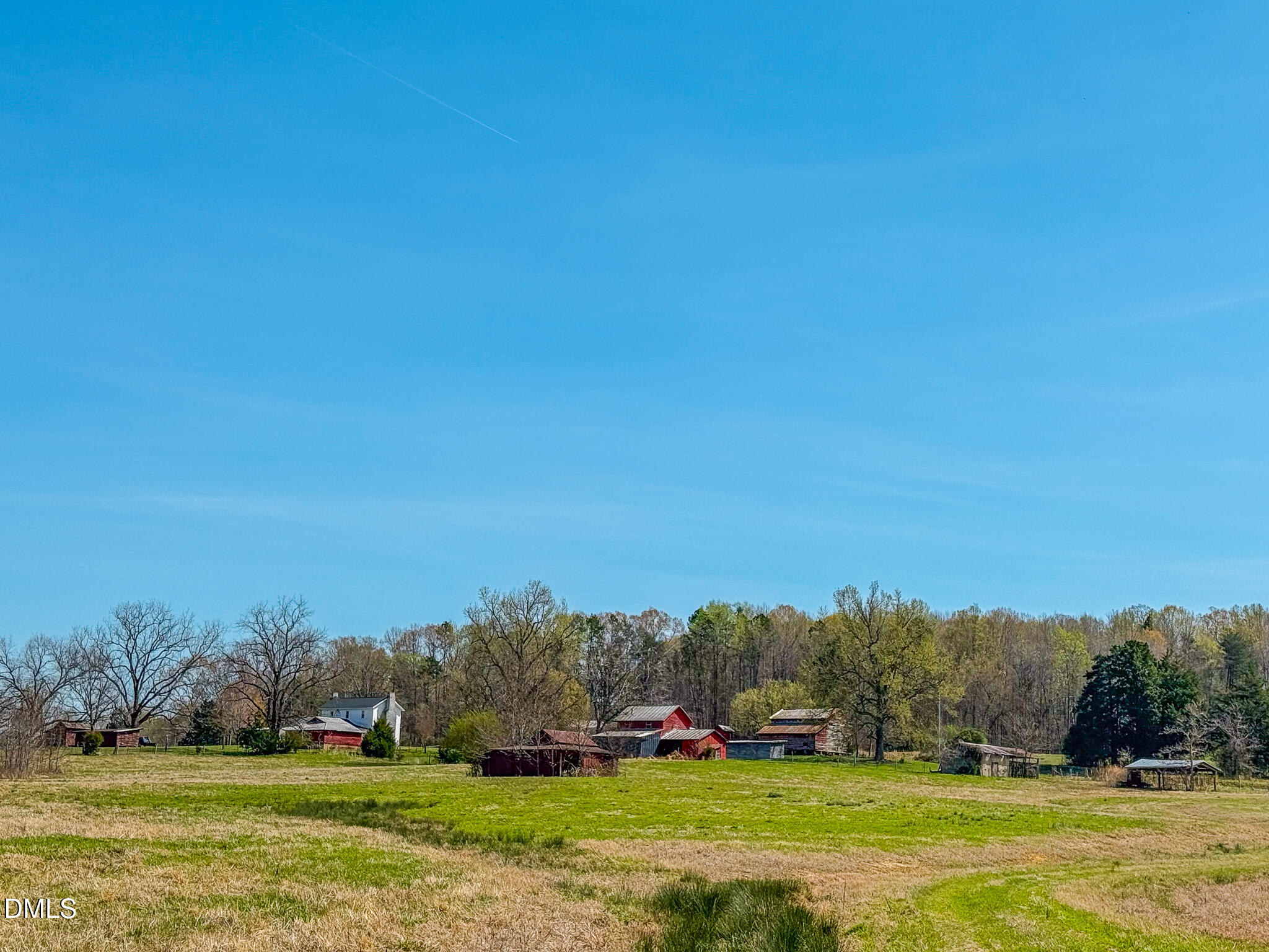 1001 Charlie Reade Road Timberlake, NC 27583 - Photo 47 of 64 a view of a golf course with a lake