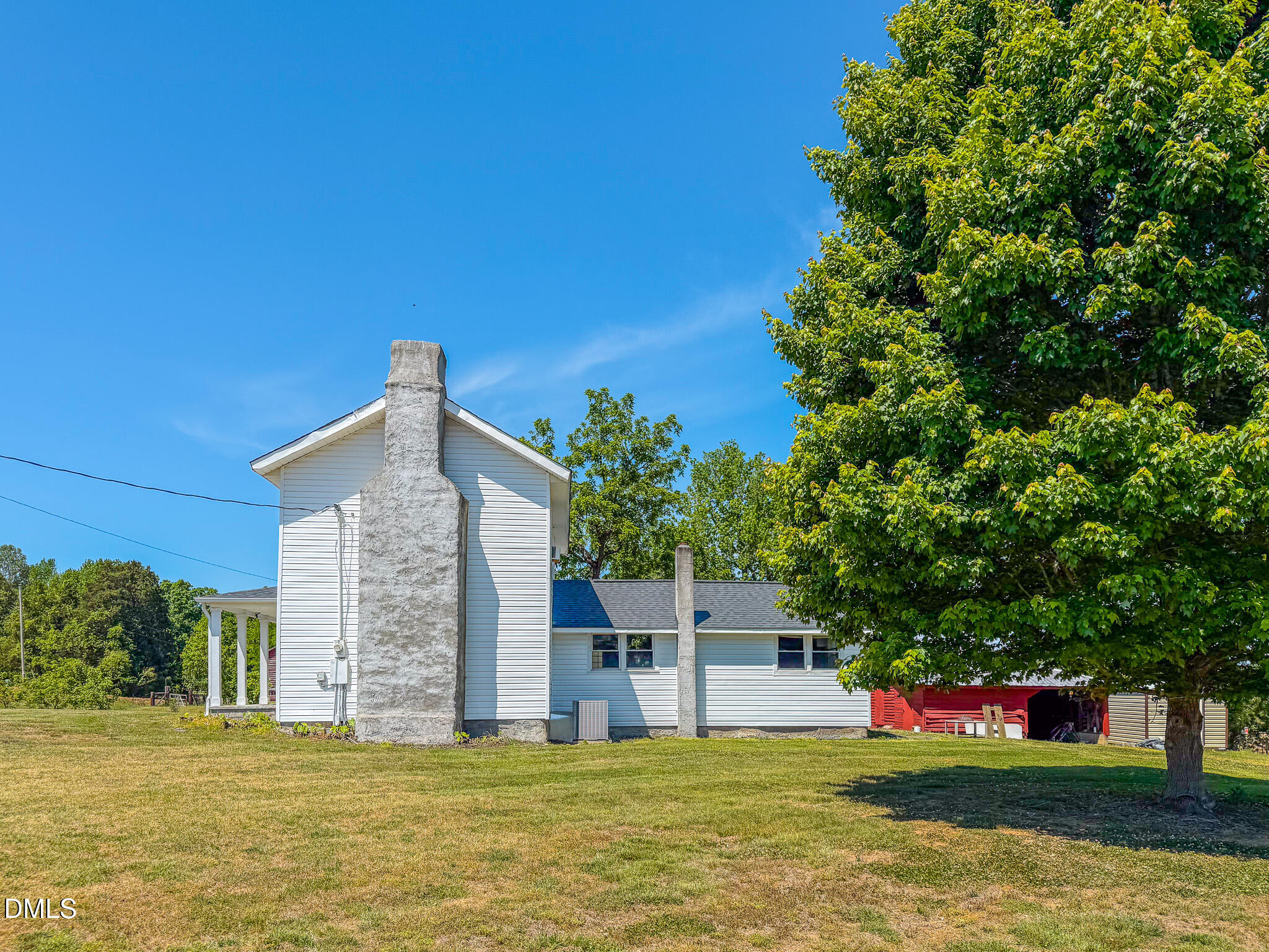 1001 Charlie Reade Road Timberlake, NC 27583 - Photo 55 of 64 a view of a house with a yard