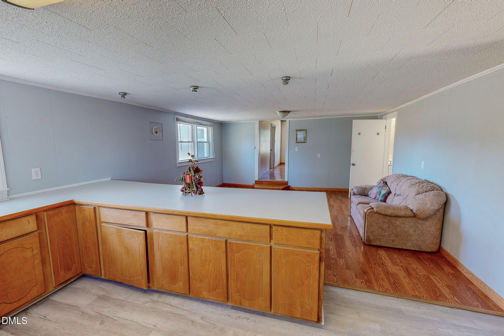1001 Charlie Reade Road Timberlake, NC 27583 - Photo 10 of 64 a living room with furniture and a wooden floor