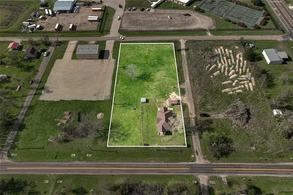 a view of a lake with a yard